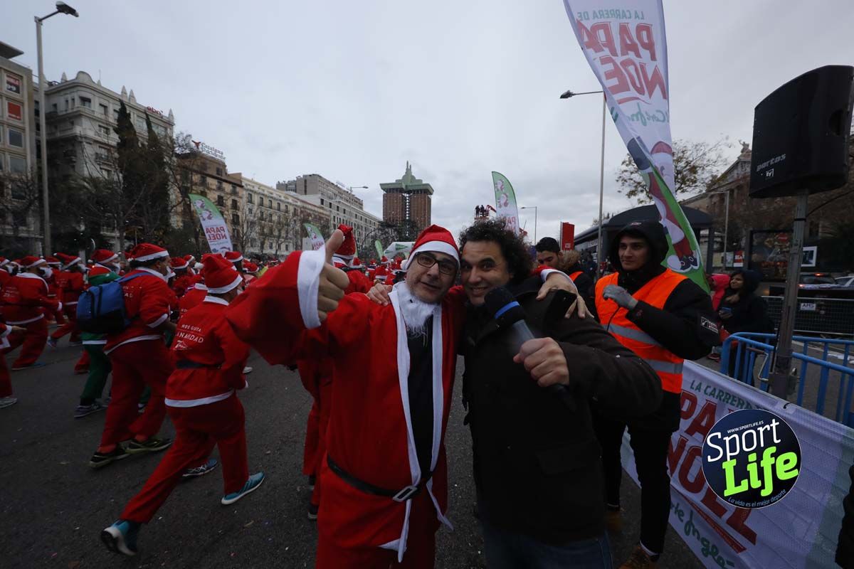 El ambiente de la Carrera de Papá Noel en Madrid