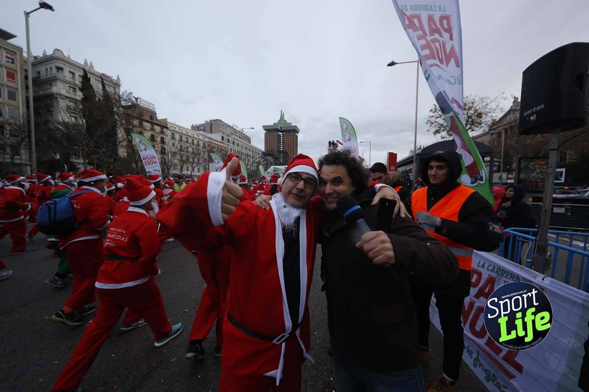 El ambiente de la Carrera de Papá Noel en Madrid