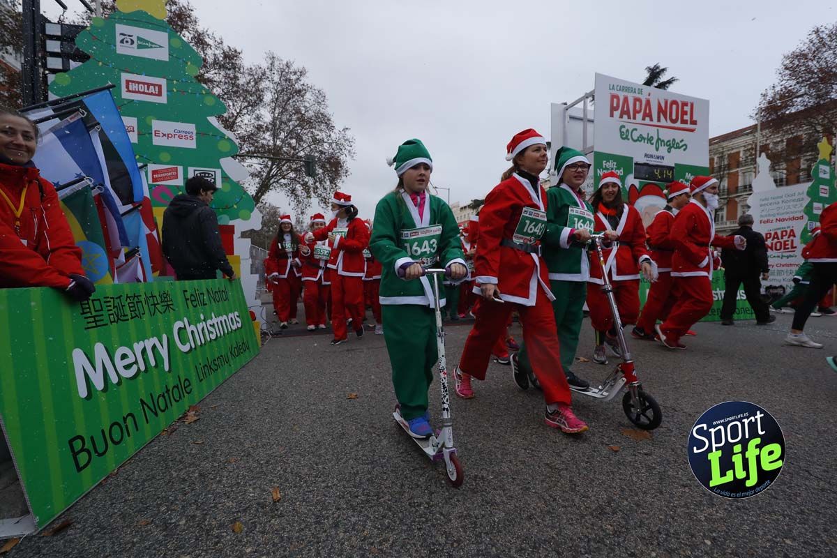 El ambiente de la Carrera de Papá Noel en Madrid
