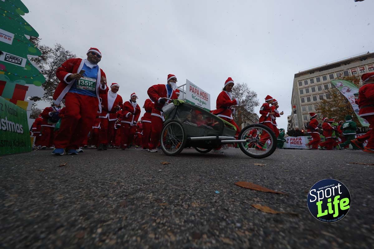 El ambiente de la Carrera de Papá Noel en Madrid