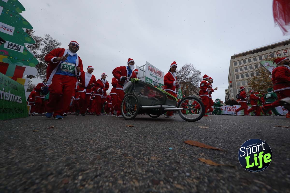 El ambiente de la Carrera de Papá Noel en Madrid