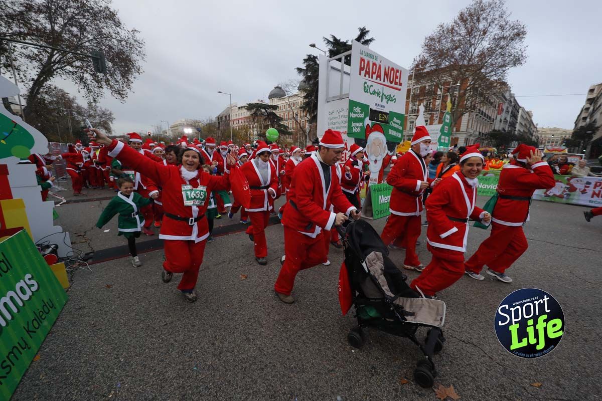 El ambiente de la Carrera de Papá Noel en Madrid