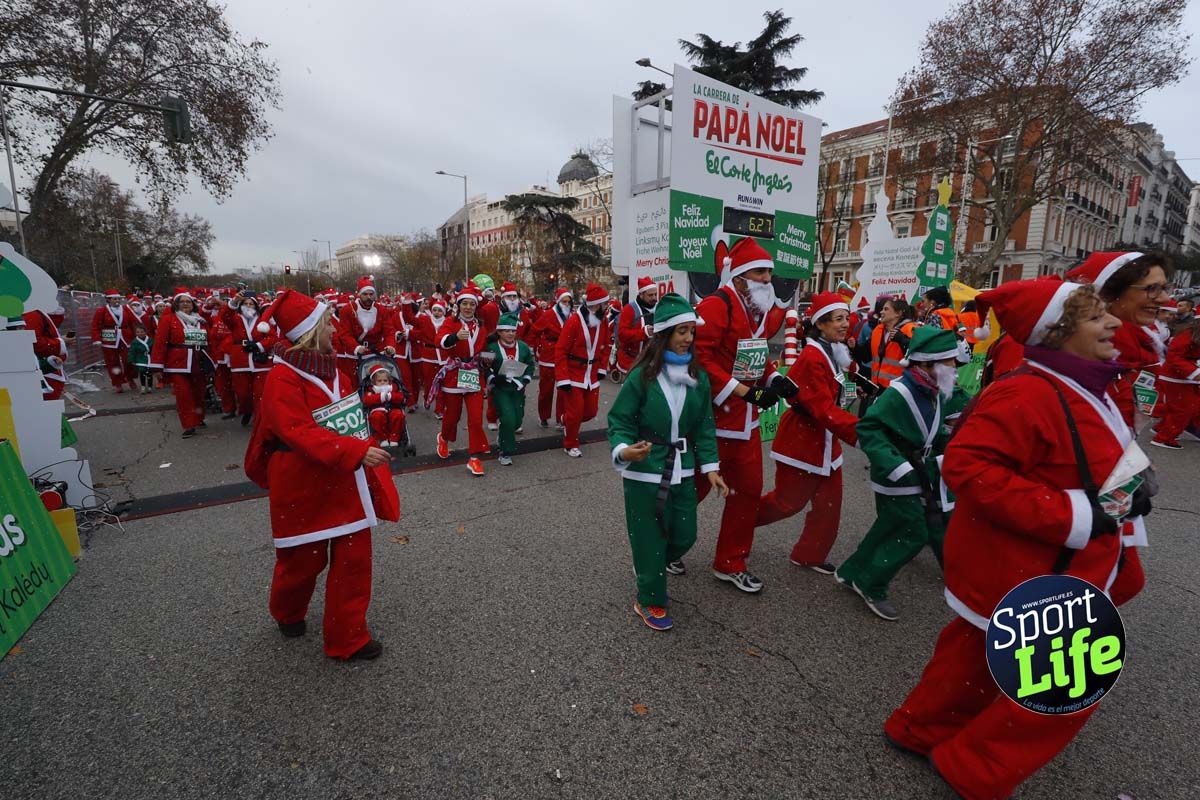 El ambiente de la Carrera de Papá Noel en Madrid