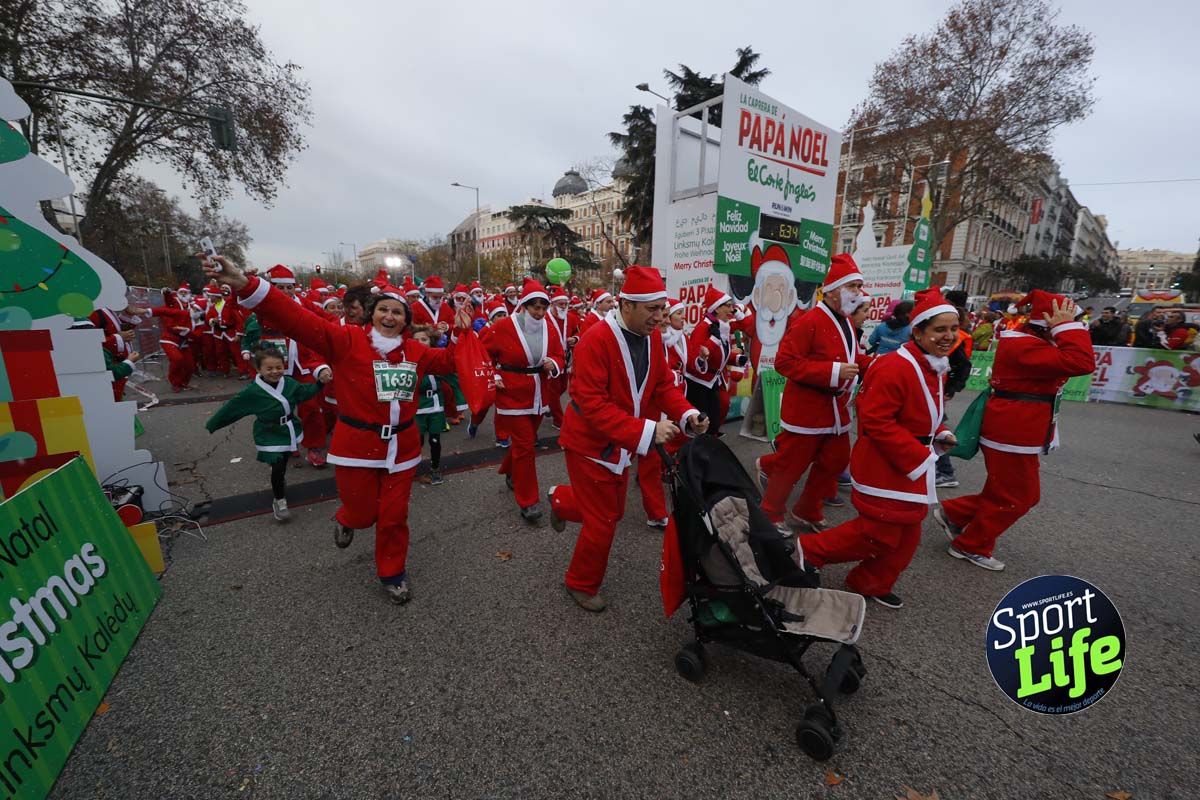 El ambiente de la Carrera de Papá Noel en Madrid